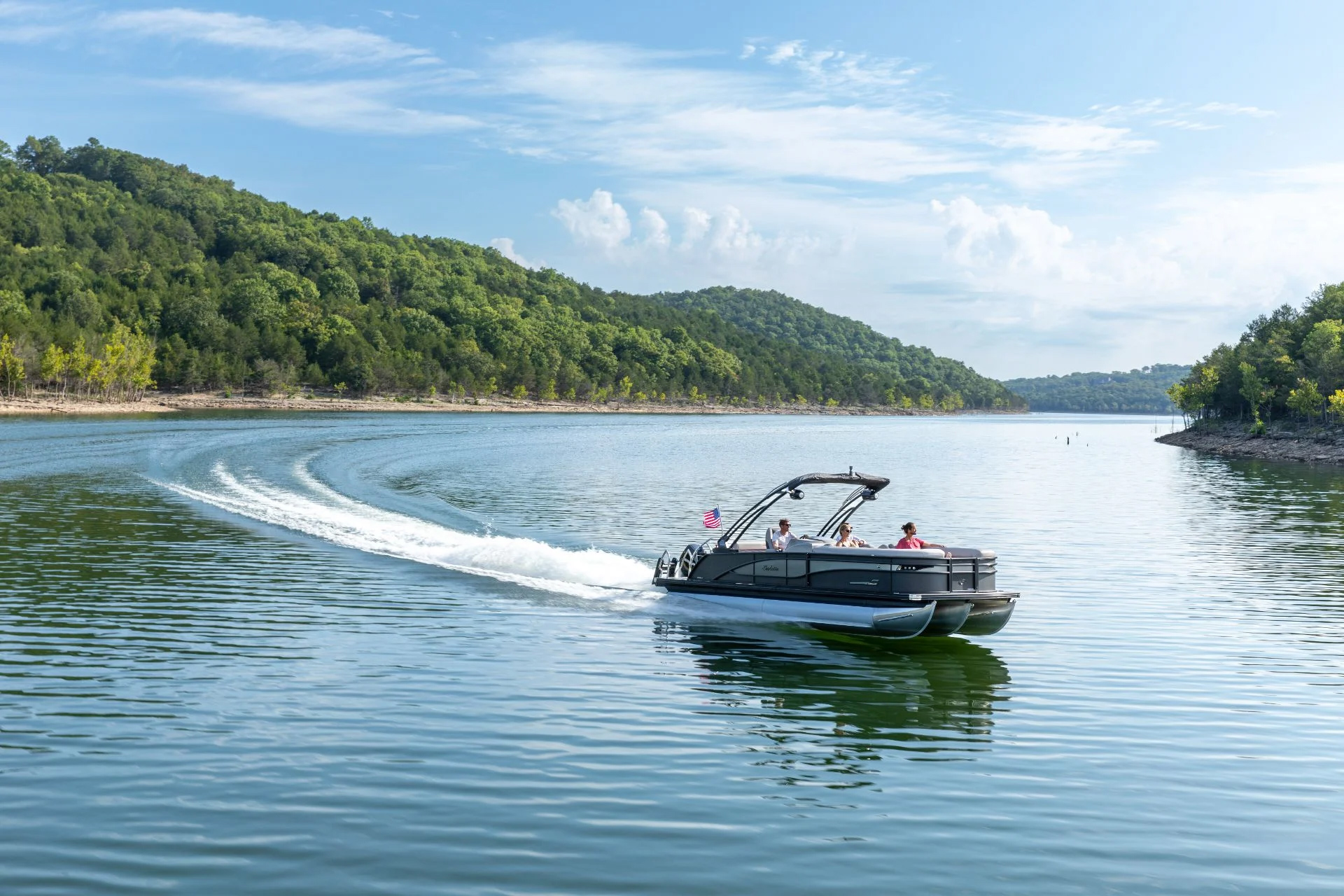 A boat gliding across a lake